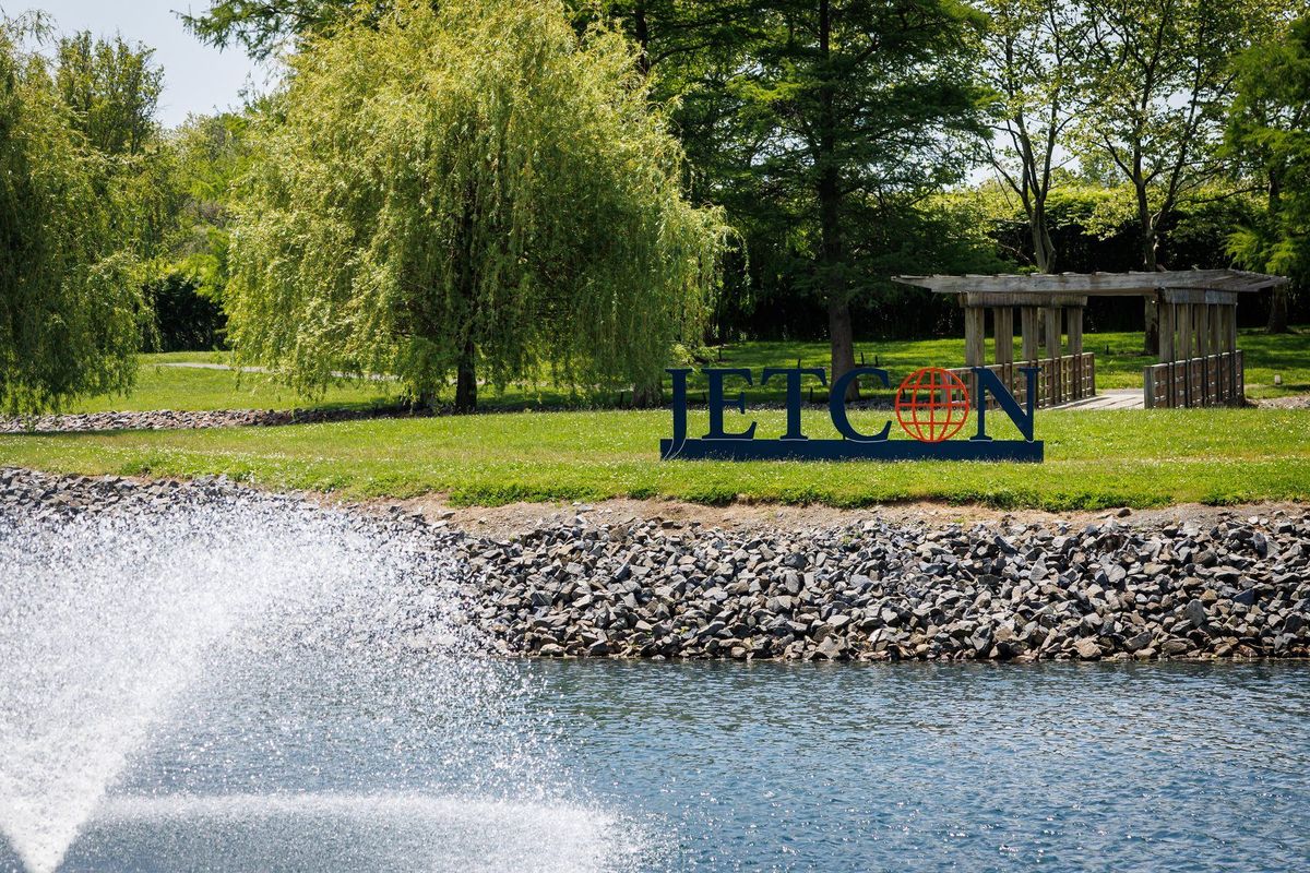 The Jetcon sign on the lawn across the water from the venue